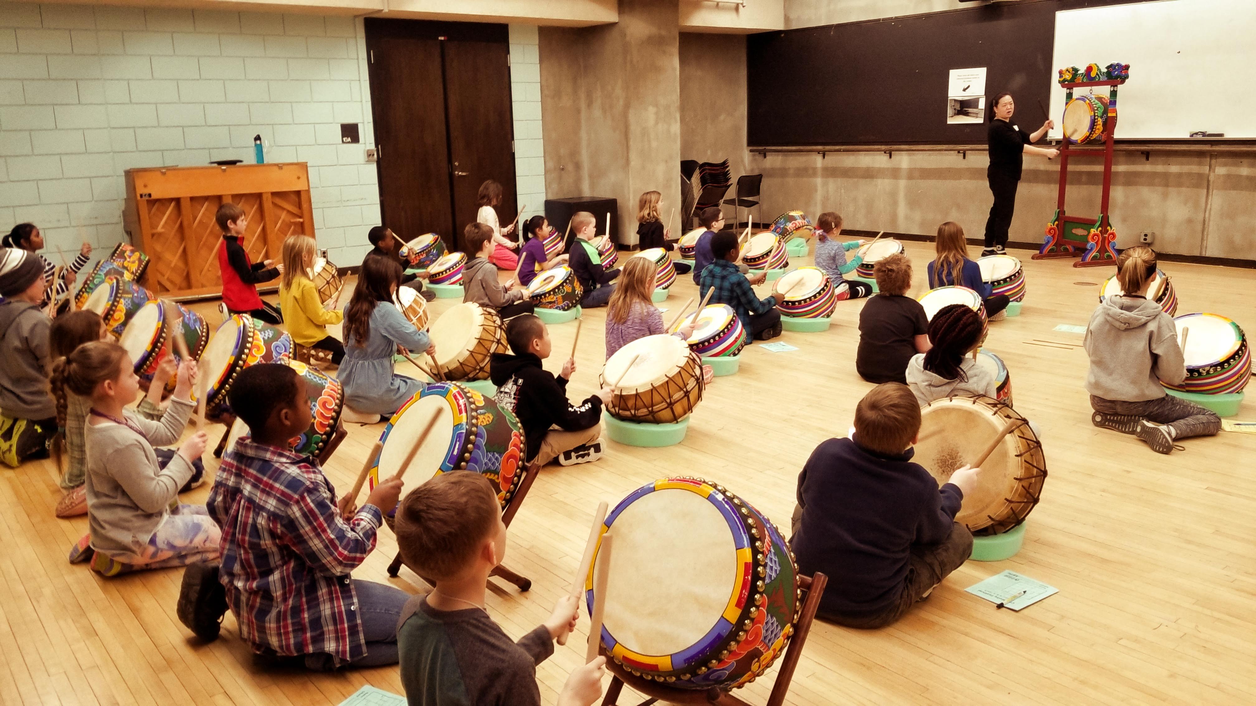Students participating in Indonesian music session