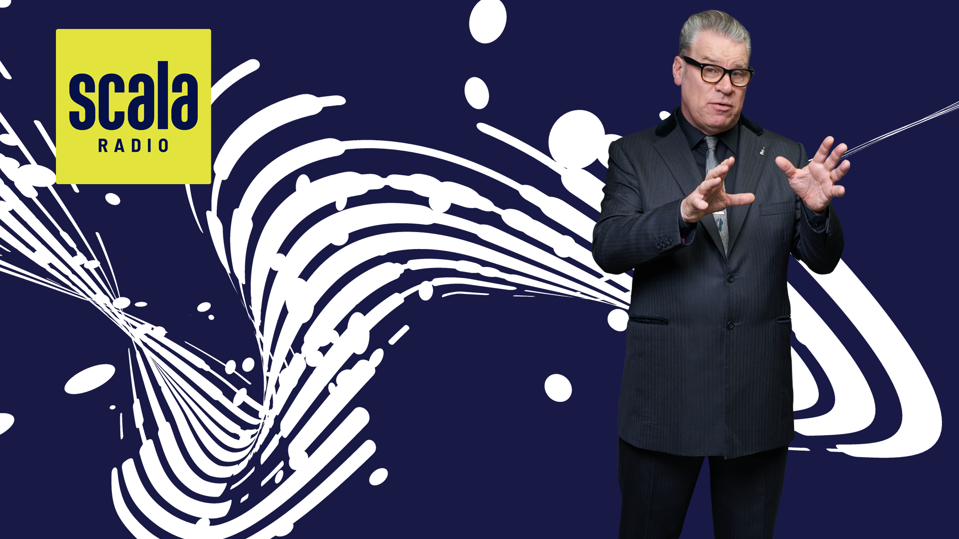 man in suit gesturing