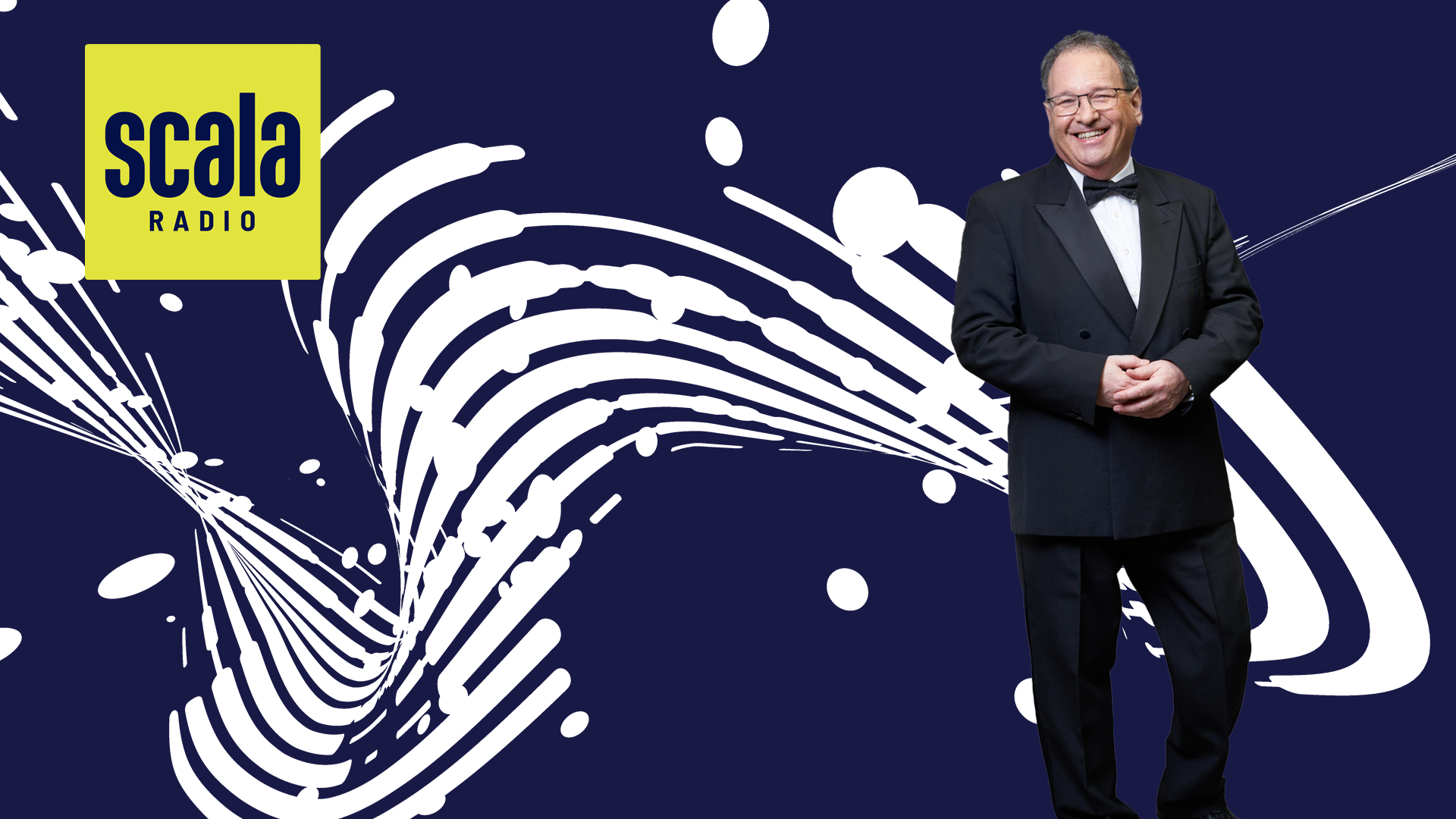 man in dinner jacket smiling