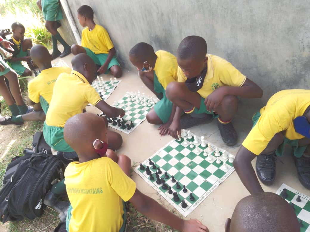 Primary school children playing chess