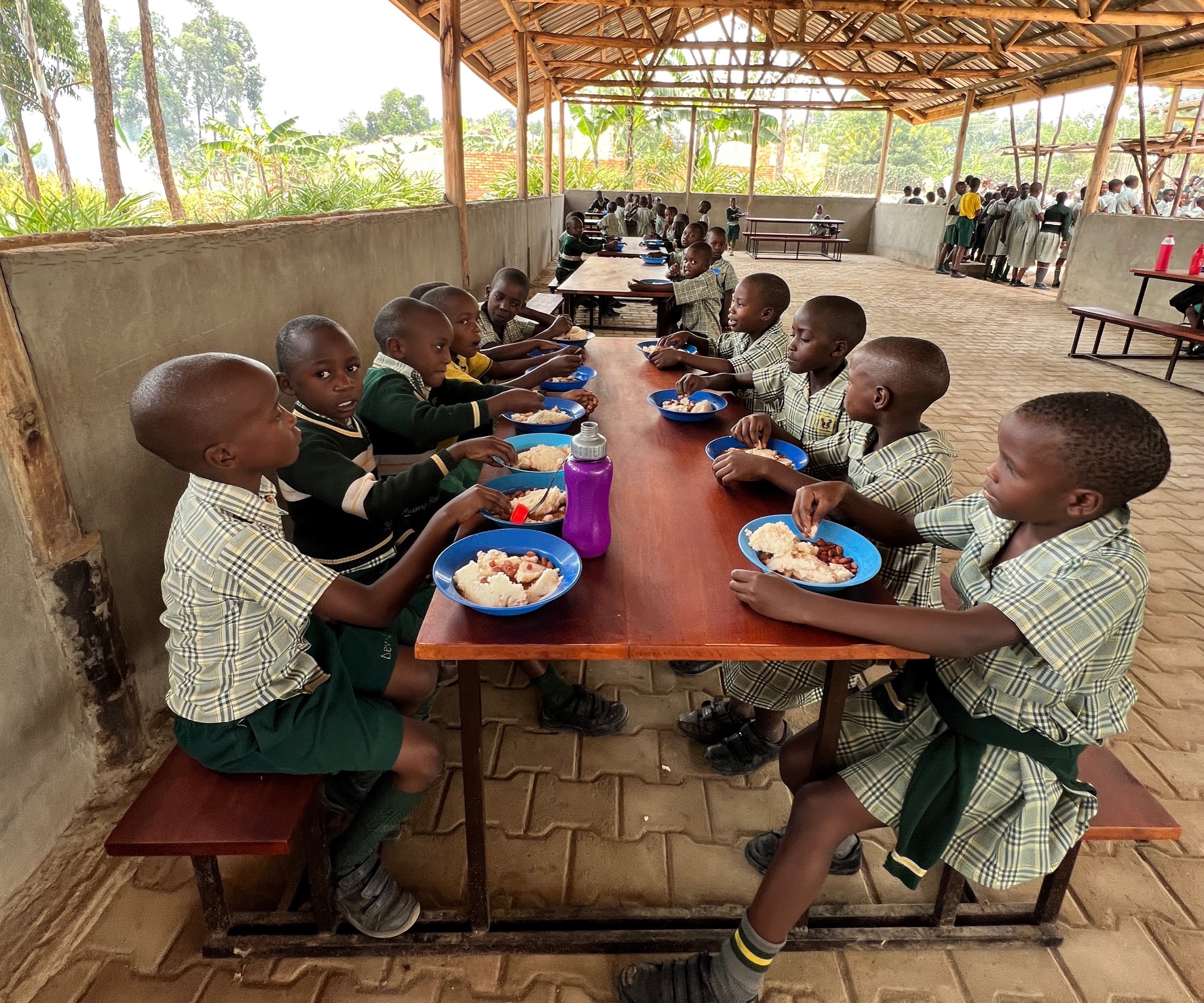 Mustard Seed Primary School students eating lunch in the new High Mountain Dining Hall